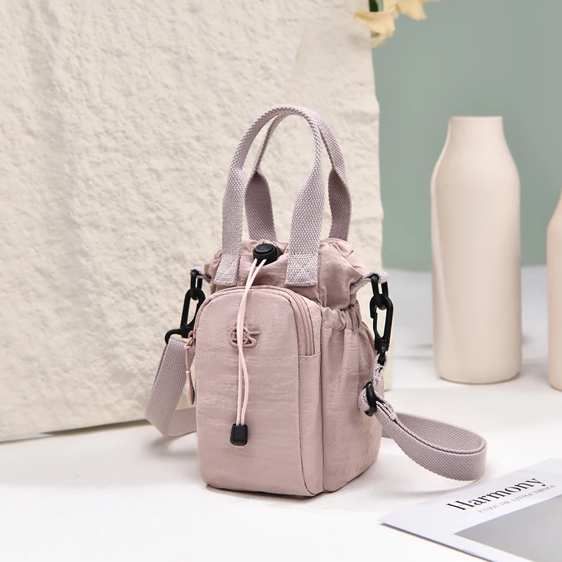 Tragbare Wasserflaschentasche mit Kordelzug, Kleine Handtasche mit Handyfach und Verstellbarem Schultergurt für Reisen und Spaziergänge – Detail 3