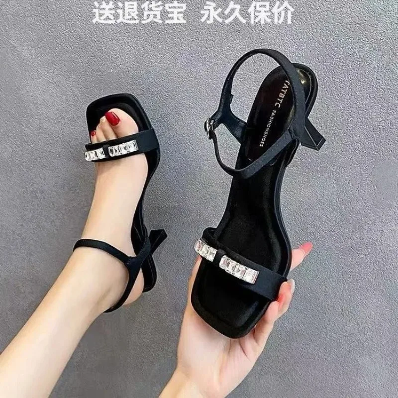 

2026 Summer New High Heels Women's Stiletto Wildmatch Square Toe Open Toe One Buckle Rhinestone Sandals