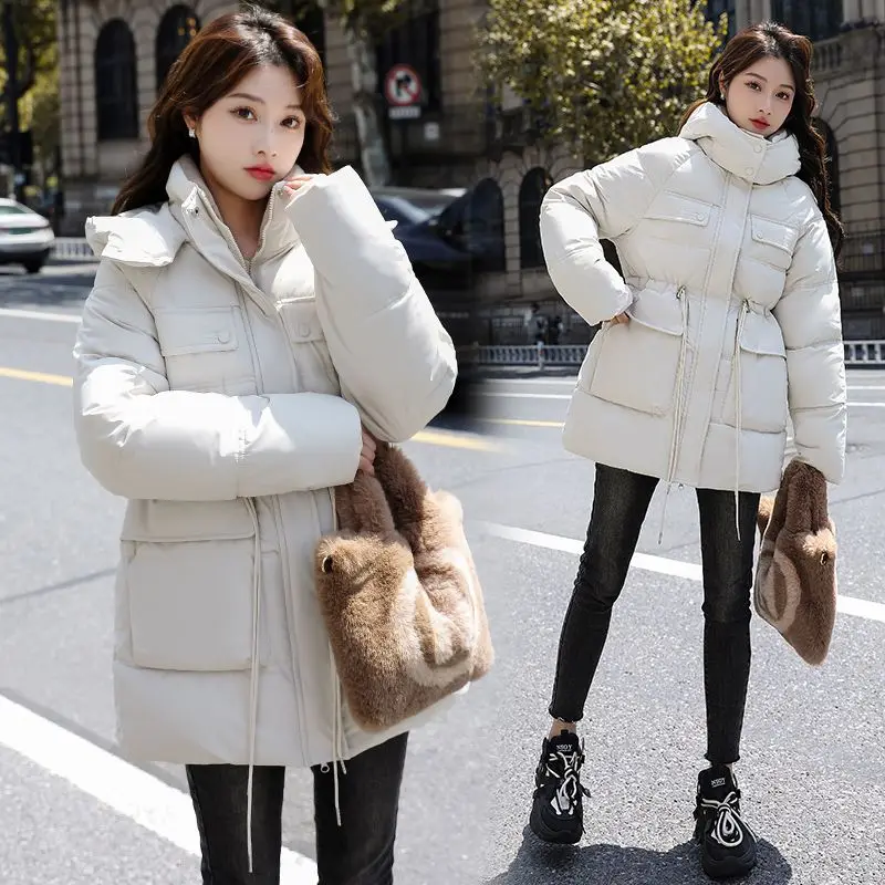 معطف شتوي نسائي جاكيت دافئ من القطن سترات جديدة متوسطة الطول مبطنة بالقطن معطف نسائي كوري فضفاض بقلنسوة