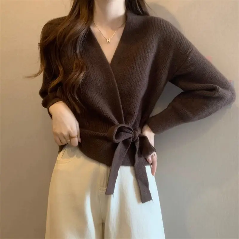 Cross shaped irregular strap waist slimming sweater cardigan women in autumn and winter chic lantern sleeve loose knit sweater