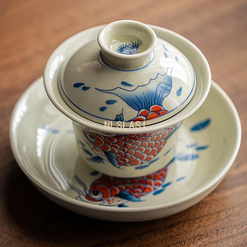 طقم شاي صيني طقم شاي سيراميك منزلي وعاء مغطى بالأسماك الذهبية أدوات شرب المطبخ سيراميك كونغ فو ، طقم شاي Pu Erh