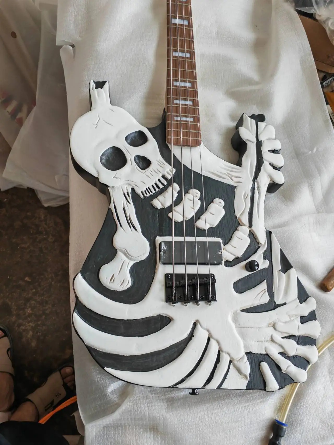 Hand Carved 4-string Skull Electric Bass Guitar with Engraved Closed Pickups Black Hardware