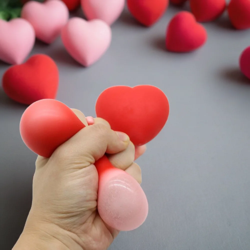 Bola anti-stress em forma de coração para crianças, bola anti-stress suave, jogos ao ar livre, brinquedos de alívio, relaxar, presentes divertidos, atacado