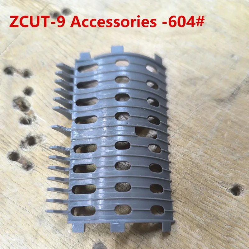ZCUT-9 604 #   أجزاء آلة قطع الشريط الأوتوماتيكية صندوق السكين موزع الشريط الكهربائي مكونات الملحقات 211 #   418 #   504 #   506 #