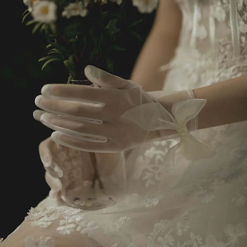 Guantes de boda cortos con lazo para mujer, mitones de tul, guantes de dedo de perla, encaje blanco, hecho a mano, Sexy