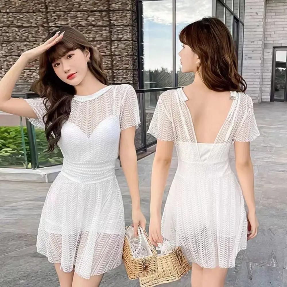 Traje de baño con falda de encaje calado de malla dulce, traje de baño transparente de manga corta para aguas termales, ropa de playa sin espalda con playa acolchada