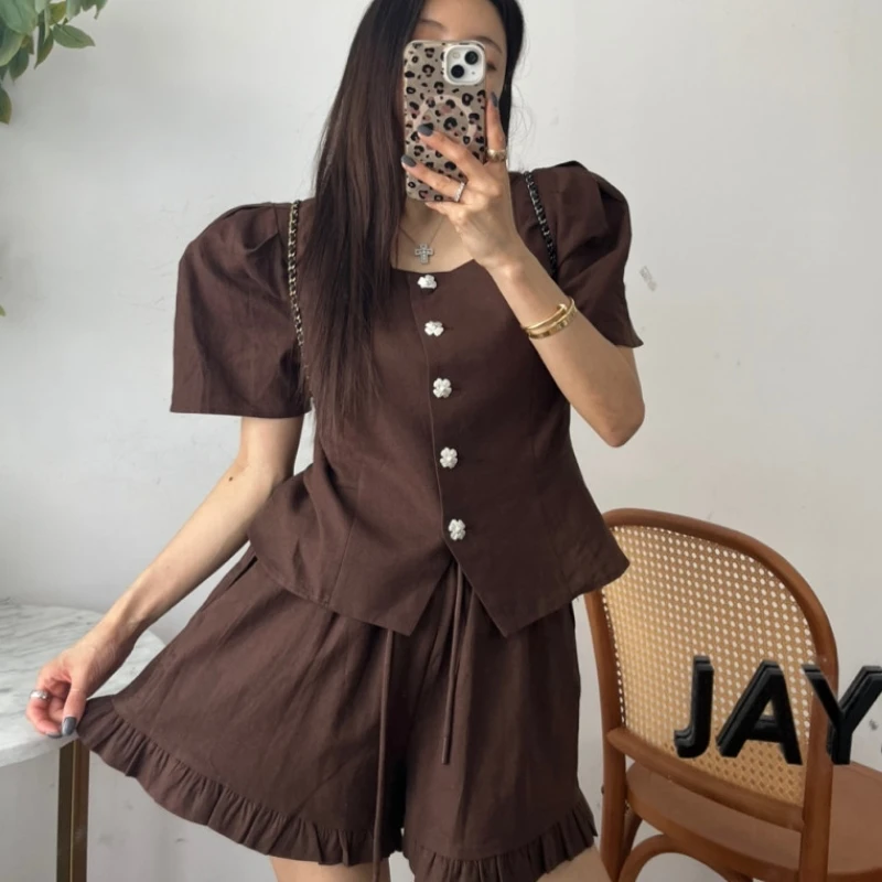 

2026 Summer Women's Bubble Sleeve Short Sleeve Top with Flower Buckle And Wide Leg Short Pants Set Drawstring High Waist Casu...