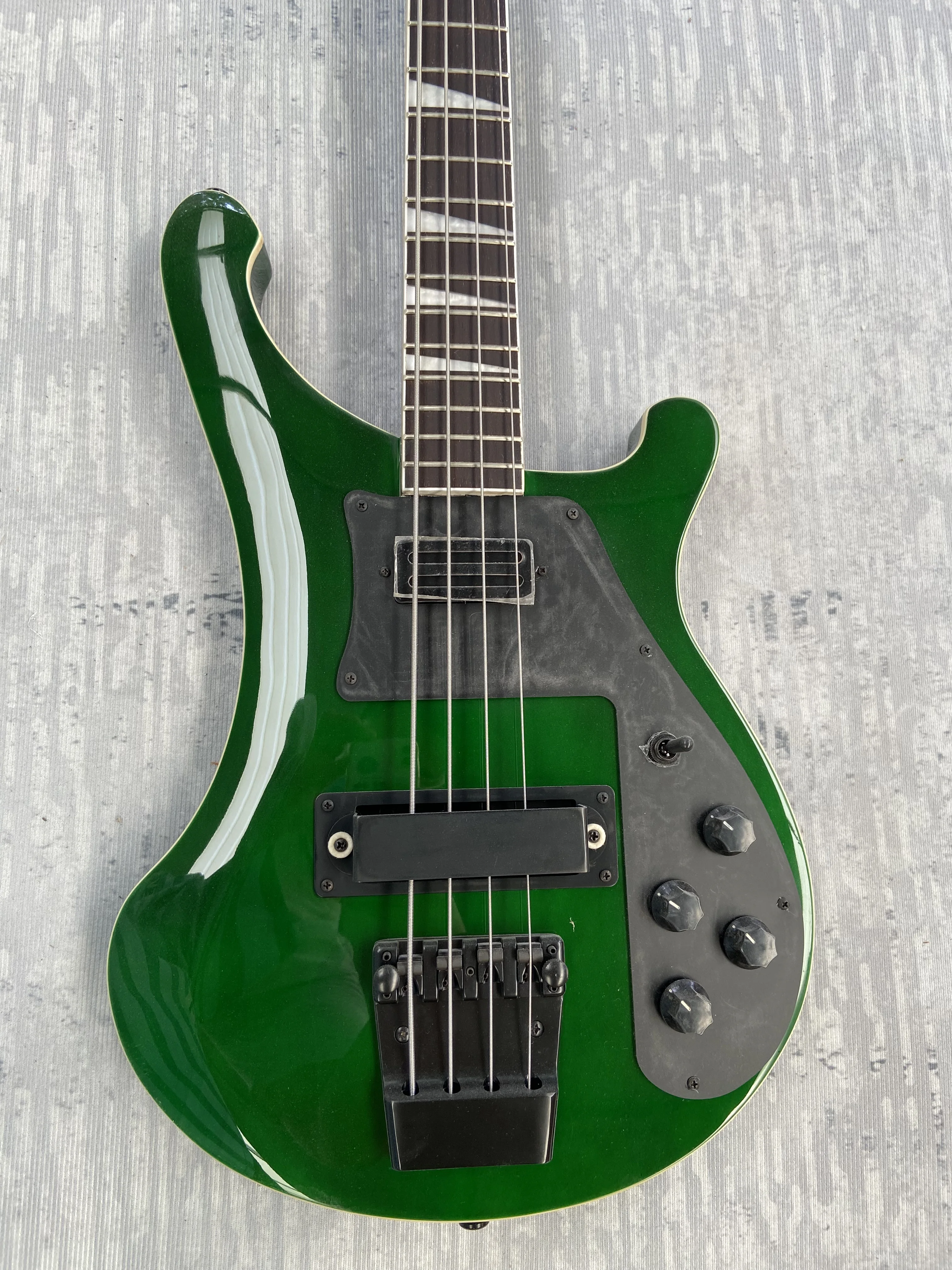 Rickenbacker 4003 bass, mahogany body, 4 string, have logo. Made in China, green transparent