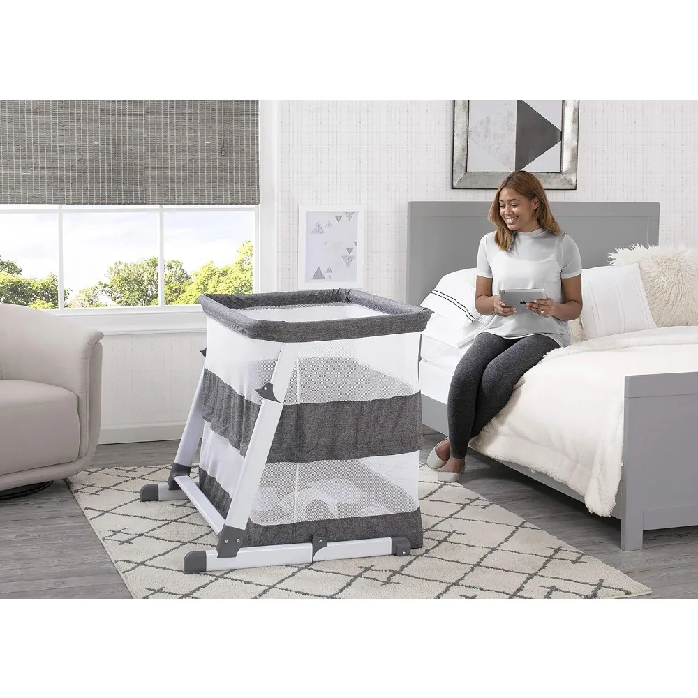 Simmons Kids Room2Grow 2-in-1 Newborn Bedside Bassinet & Infant Sleeper - Height Adjustable Portable Crib with Wheels & Airflow