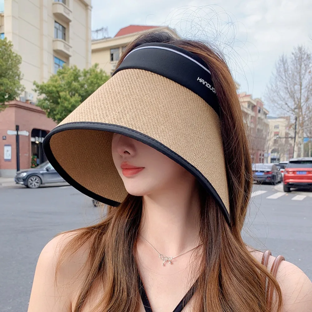 

Trendy Foldable Woven Empty Top Cap Bow UV Protection Wide Brim Bucket Hat Sunshade Straw Plaited Hollow Straw Hat Beach