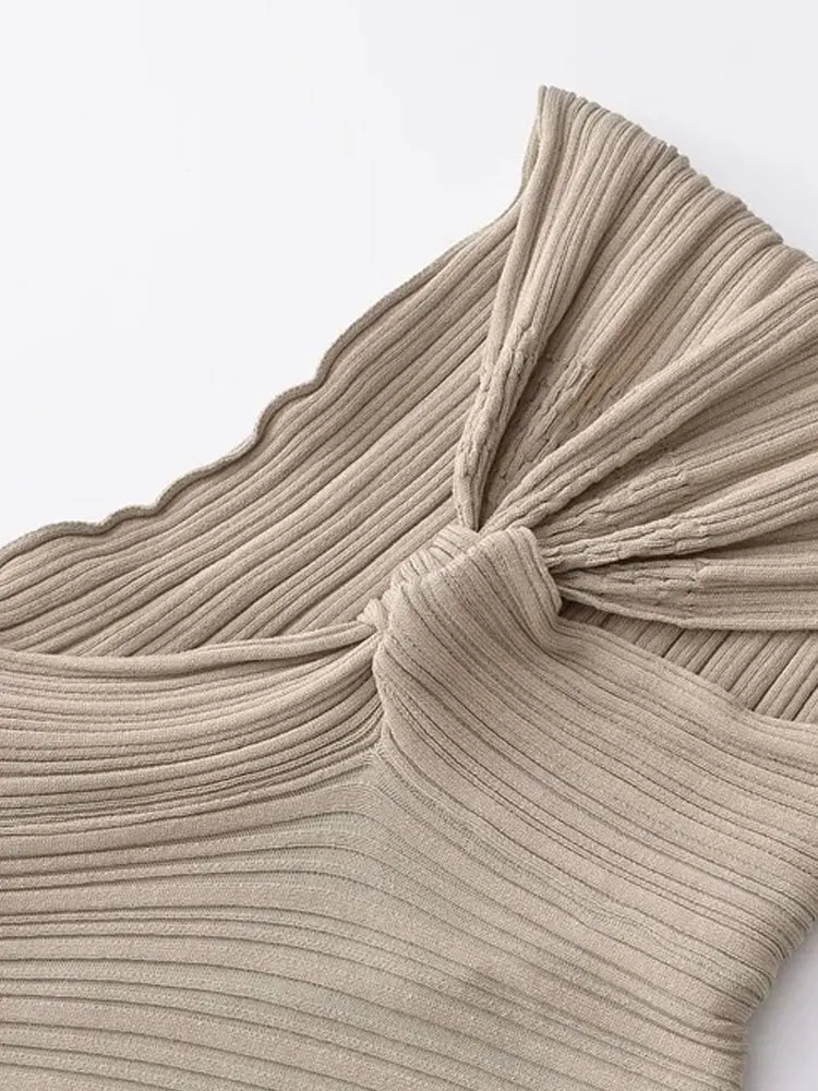 เสื้อครอปถักลายริบแบบไม่สมมาตรสำหรับผู้หญิง แฟชั่นเก๋ไก๋ แขนเสื้อมีปมด้านหน้า เสื้อผู้หญิง