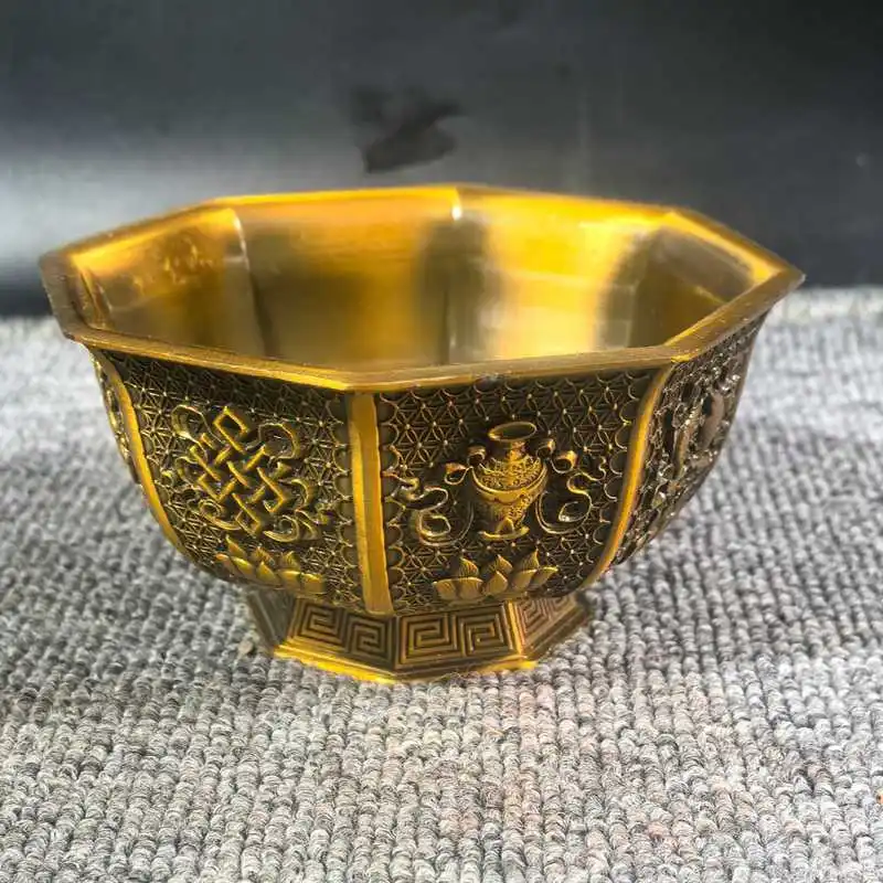 Antique-style gilded eight-treasure bowl with auspicious patterns, three-dimensional iron art carving, Tibetan-style decoration