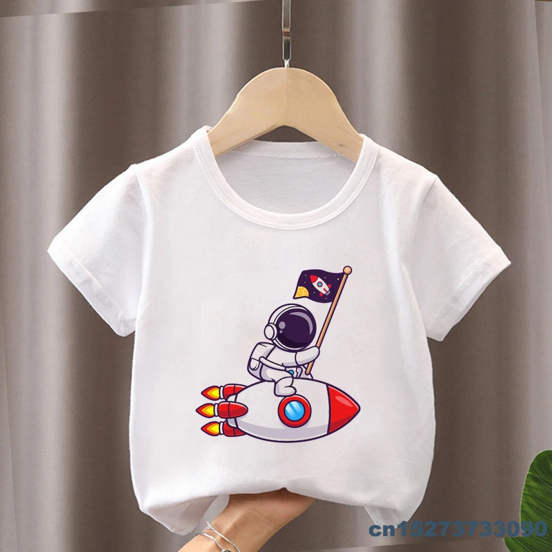 New Boys Tshirt Cute Astronaut Flying Paper Plane In Space Cartoon Print Kids Clothes Summer Girl Tshirts Funny Children Clothes