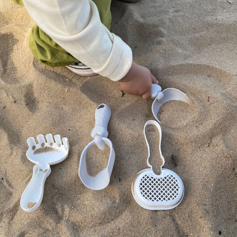 ของเล่นเด็กชายหาดชุดเล่นน้ําขุดทรายเด็กพลั่วตกปลาสุทธิขุดถังทรายเครื่องมือของเล่นริมทะเลอายุ 3 ปี