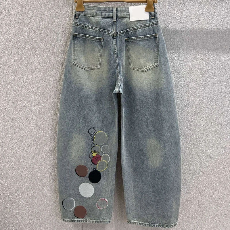 Pantalon en denim bleu aquarelle vintage pour femme de haute qualité avec un design ajusté et un jean à motif imprimé 2592488