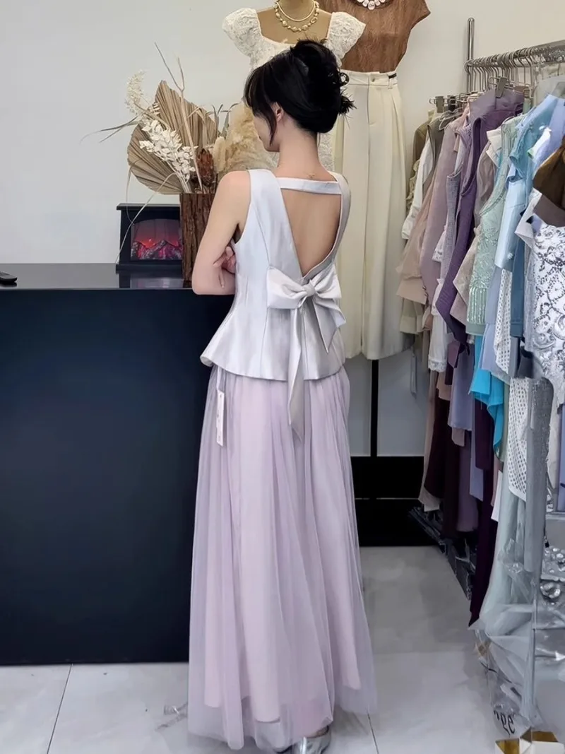 

New Sexy Back Hollow Out Bow Summer Women's Suit Korean Fashion Sleeveless Vest Top + High Waist A-line Long Skirt Two Piece Set