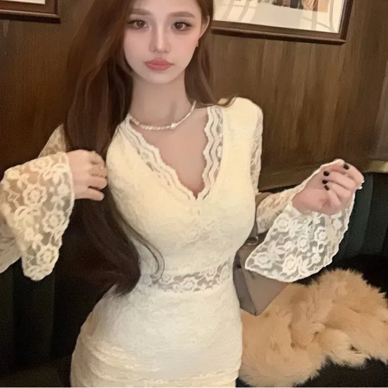 

French pure wind micro long sleeve hollow lace V-neck dress French temperament female autumn and winter package hip dress