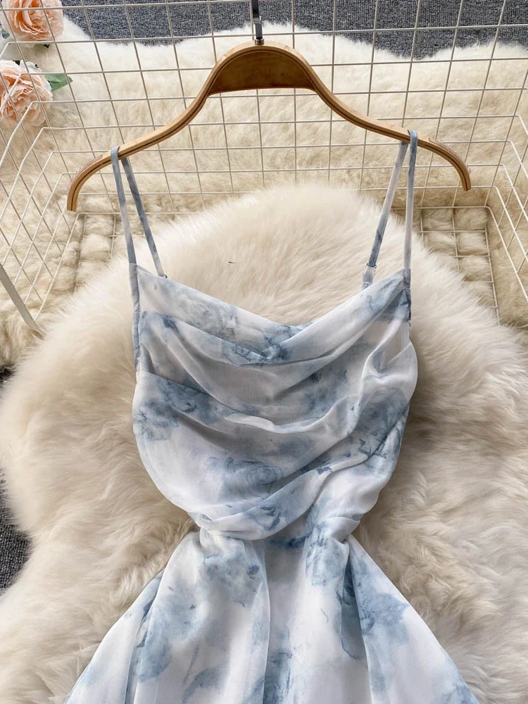 Abito lungo moda estiva donna stampa floreale Sexy Hollow Backless Strappy Party Dress femminile Boho Vacation Beach Outing prendisole