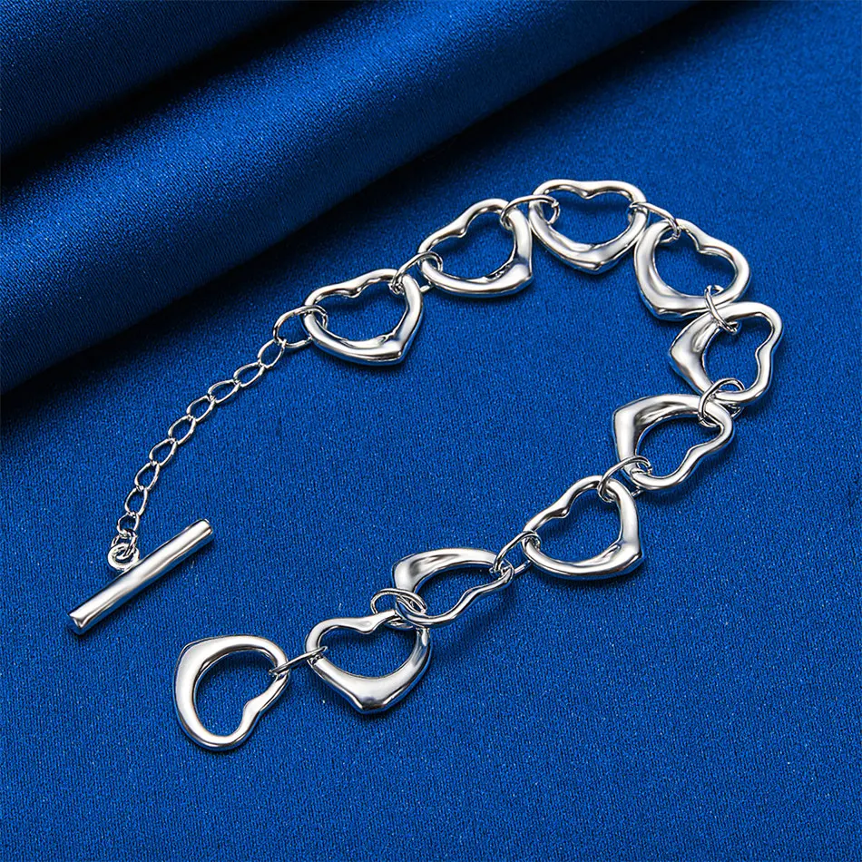 

Минималистичный браслет в форме сердца диаметром 8 дюймов — идеальный подарок для женщины, которая посещает вечеринку или свадьбу.