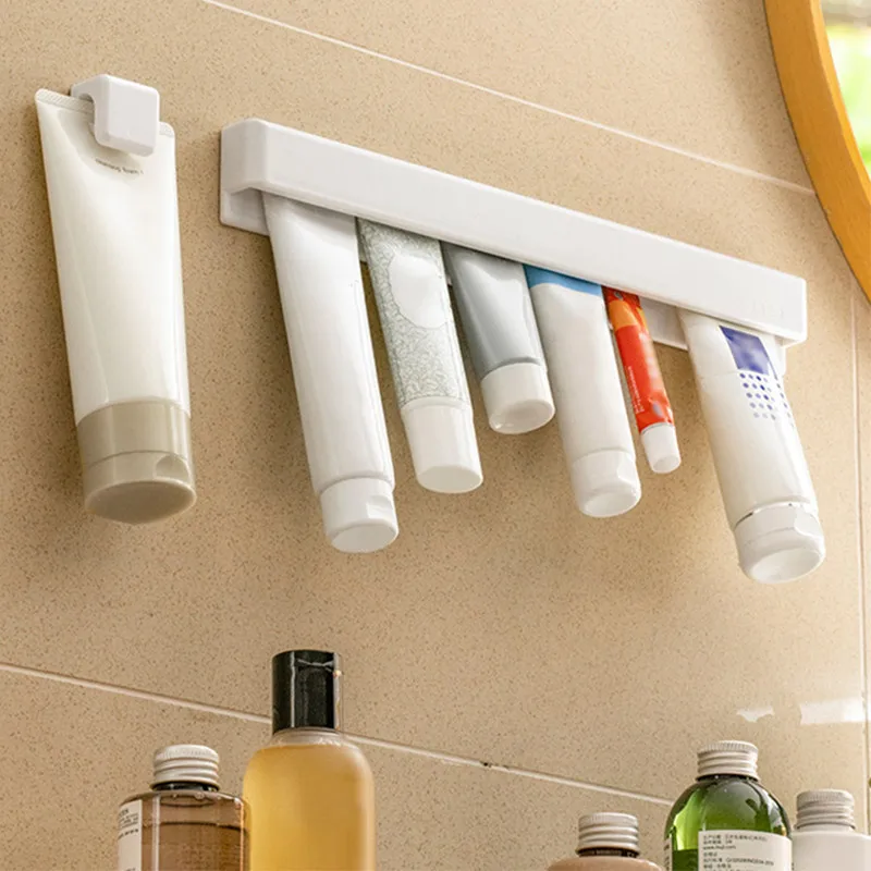 Wall Mounted Toothbrush Holder Toothpaste Clip Bathroom Non Perforated Facial Cleanser Clip Storage Squeezing Wall Storage Rack