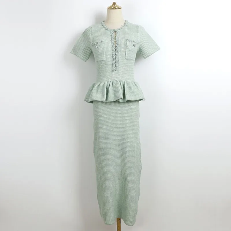   Vestido de punto elástico corto sin mangas 2025 Primavera/otoño/invierno vestido largo con borde de hoja de pescado vestido retro ceñido en la cintura