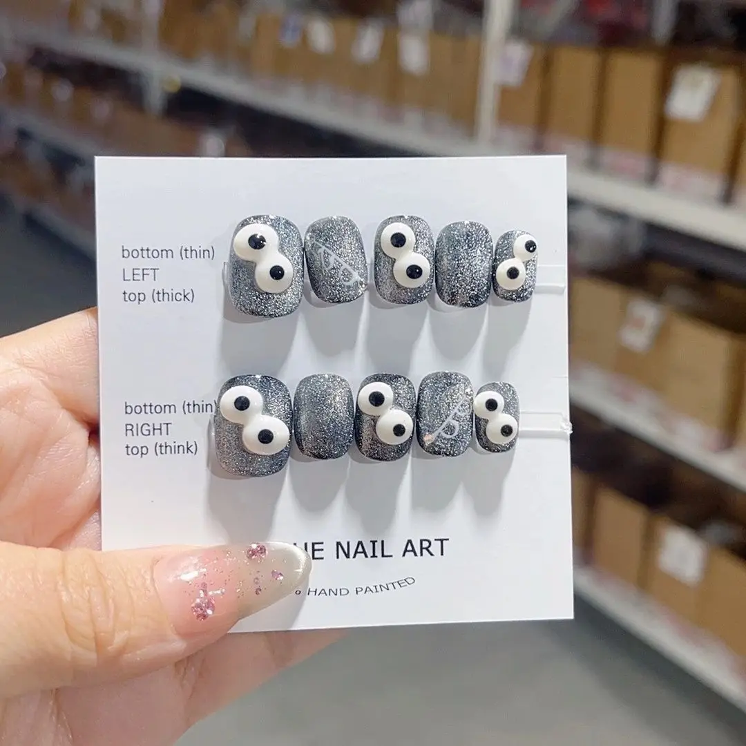 

Wholesale Bragging Short Sculpted Cartoon Eyes Detachable High-Quality Reusable Elegant White Press On Nails.No.D114