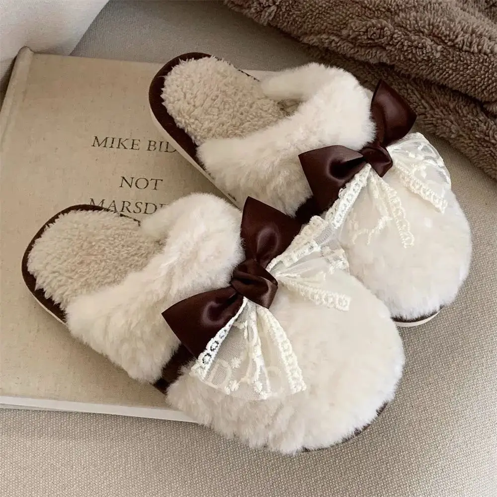 Winter Hot Sale Ladies Thick Sole Anti Slip Warm Indoor Slippers with Bow Design Velvet Furry Cotton Slippers for Home Use