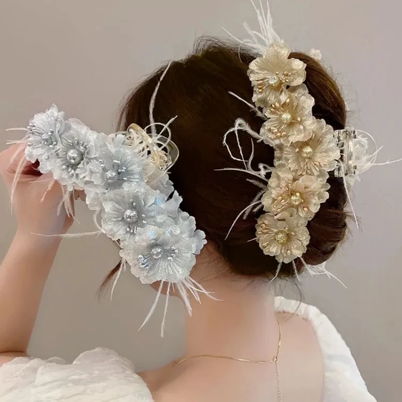 Pinces à cheveux élégantes à la mode pour femmes, pinces à fleurs en plumes, vêtements de sauna, été, automne, griffes, coiffure, accessoires