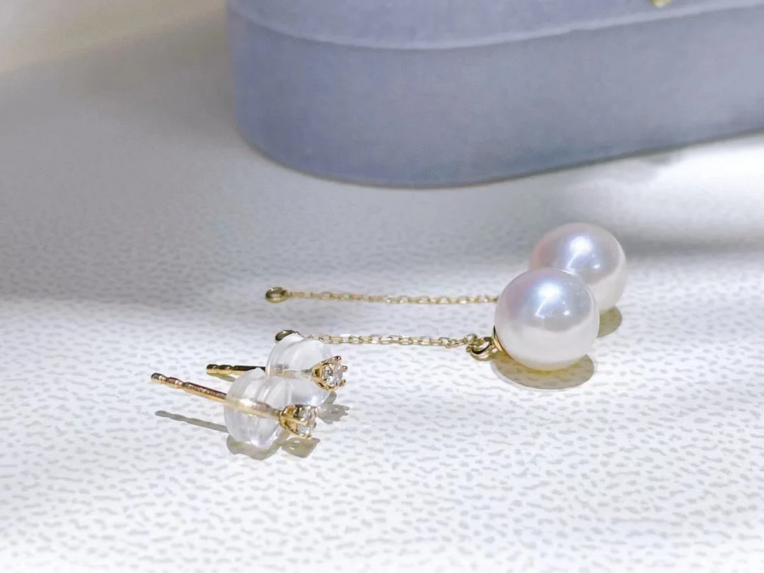 

Advanced design AAAA7-8mm natural Japanese round pearl earrings with dynamic 925s ear line