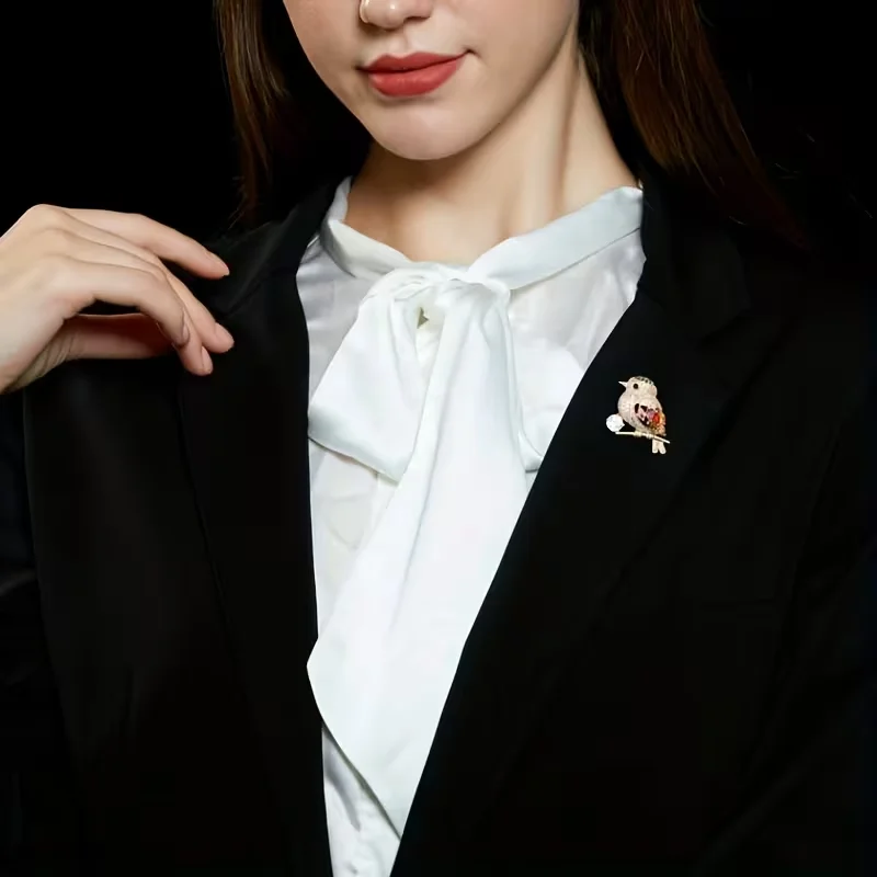 Magpie brooches, skirts, shirts, suits, evening gowns, sweaters, scarves, shawls, coat pins