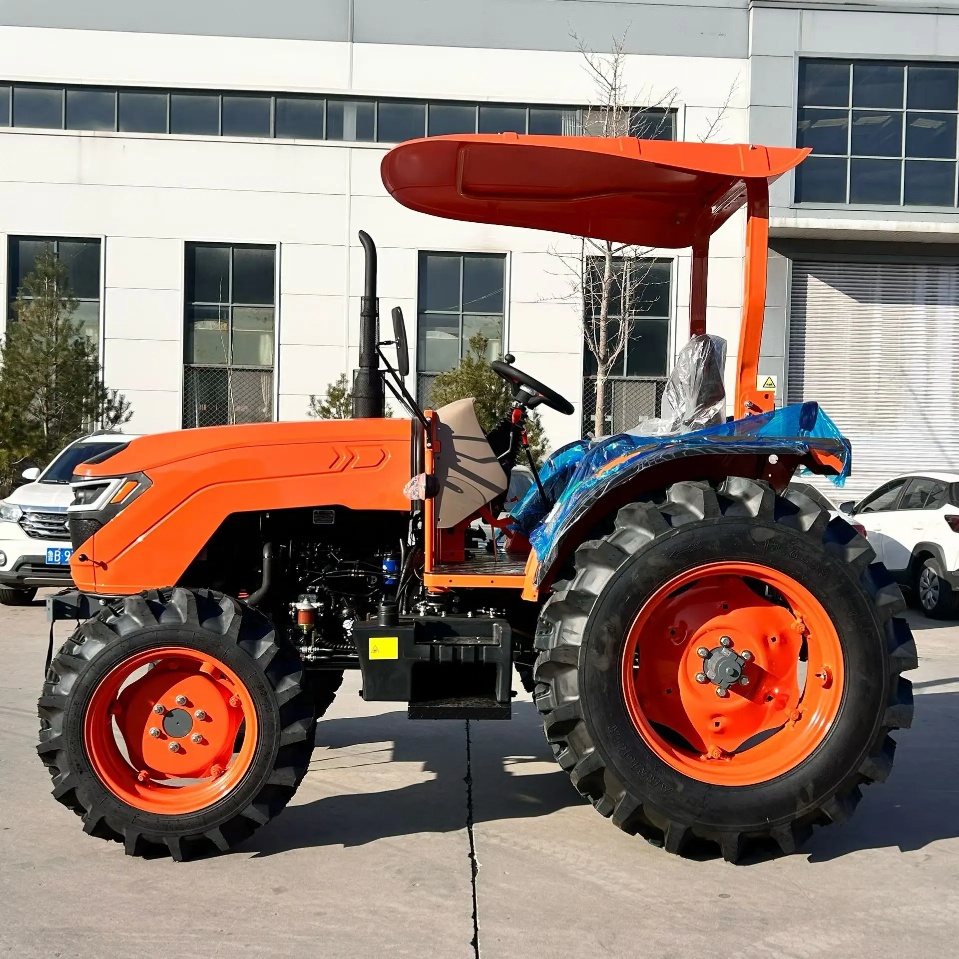 For sale: CE COC 4X4 25-150 hp mini agricultural tractor equipped with a bulldozer blade and loading blade; roadworthy.