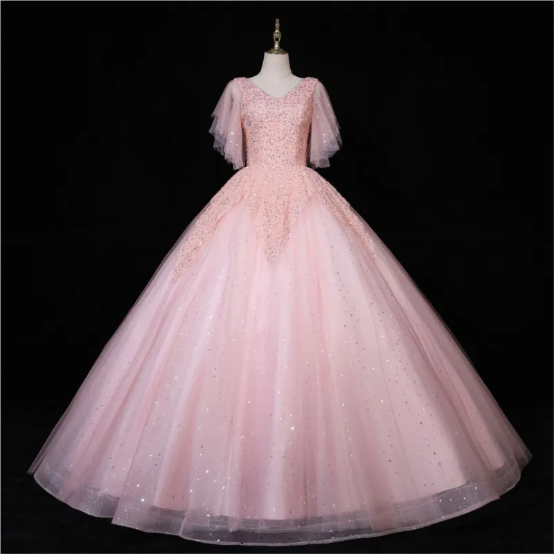 

A light pink collar puffy skirt for the performance at banquet