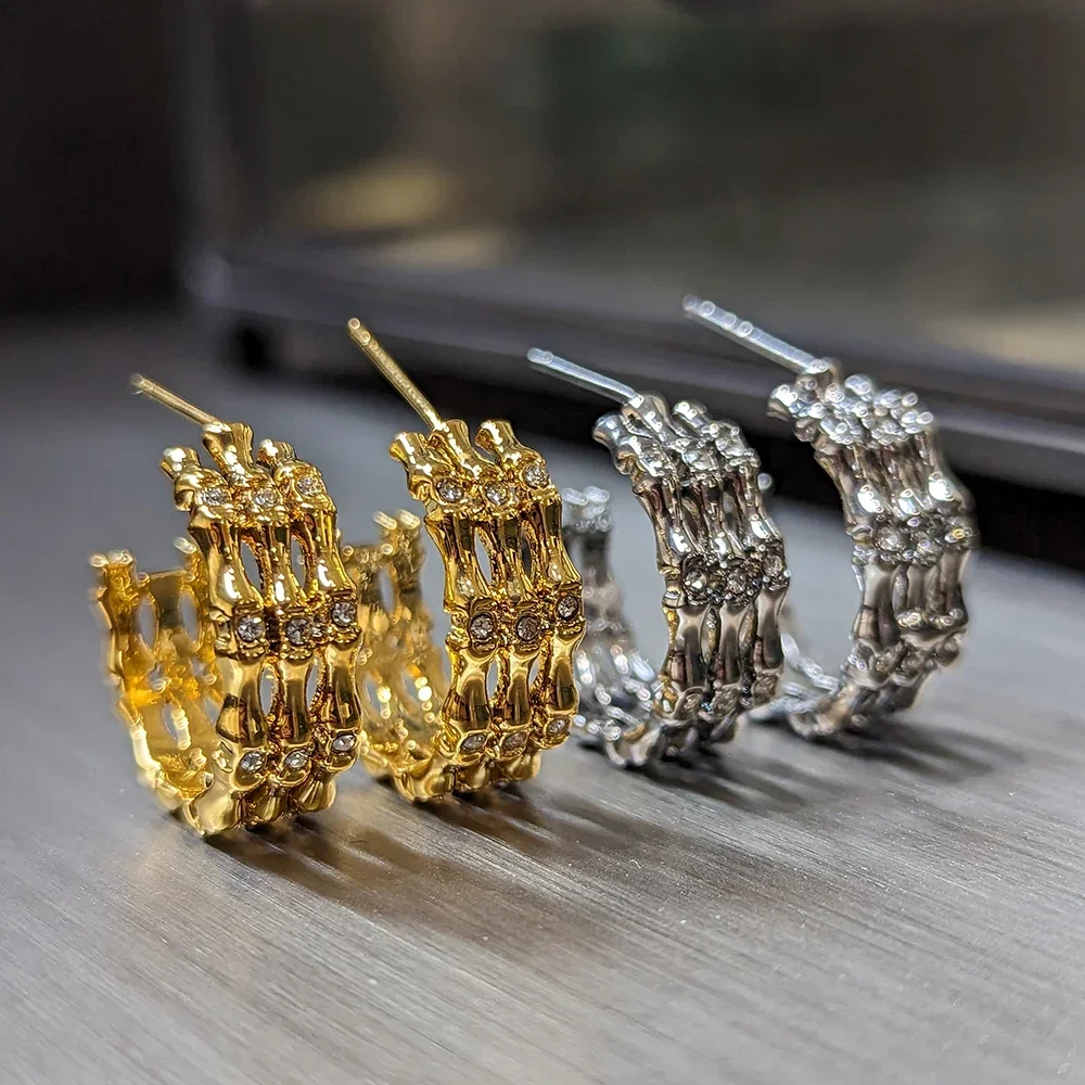 

AB/ Zinc alloy inlaid zircon bamboo shape design fashion exquisite women's hoop earrings.