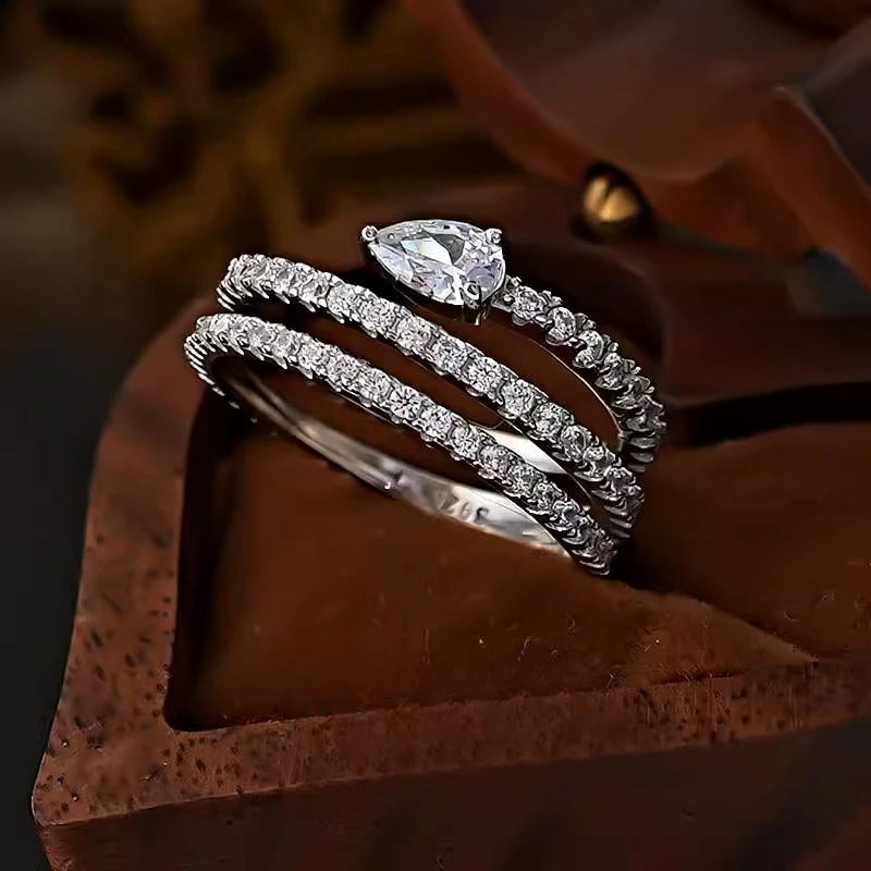 

S925 Серебряное новое кольцо с каплями змеиной воды, женское кольцо с высокоуглеродистым бриллиантом для выращивания, нишевое модное кольцо со спиральной обмоткой