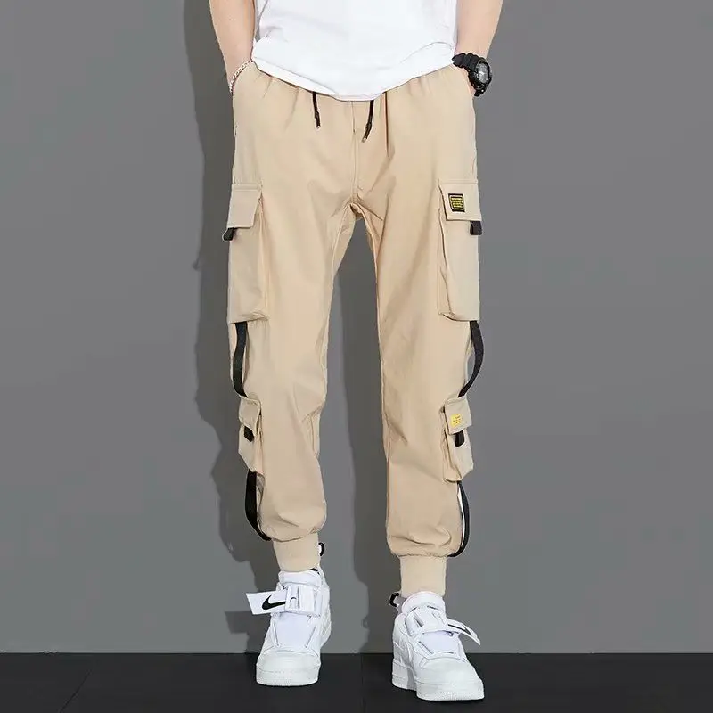 Fashion Personality Multiple Pockets Stickers Waist Drawcord Cargo Pants Man Loose Solid Color Casual Summer Trend Male Trousers