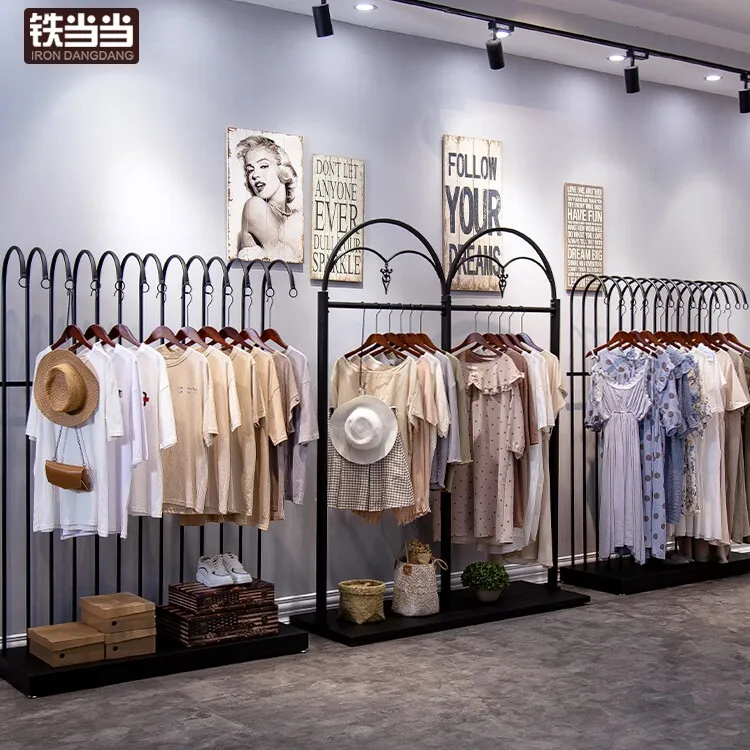 Women's clothing store shelves Clothing store hangers Display racks Floor-to-ceiling hangers Clothes racks Shelves that sell