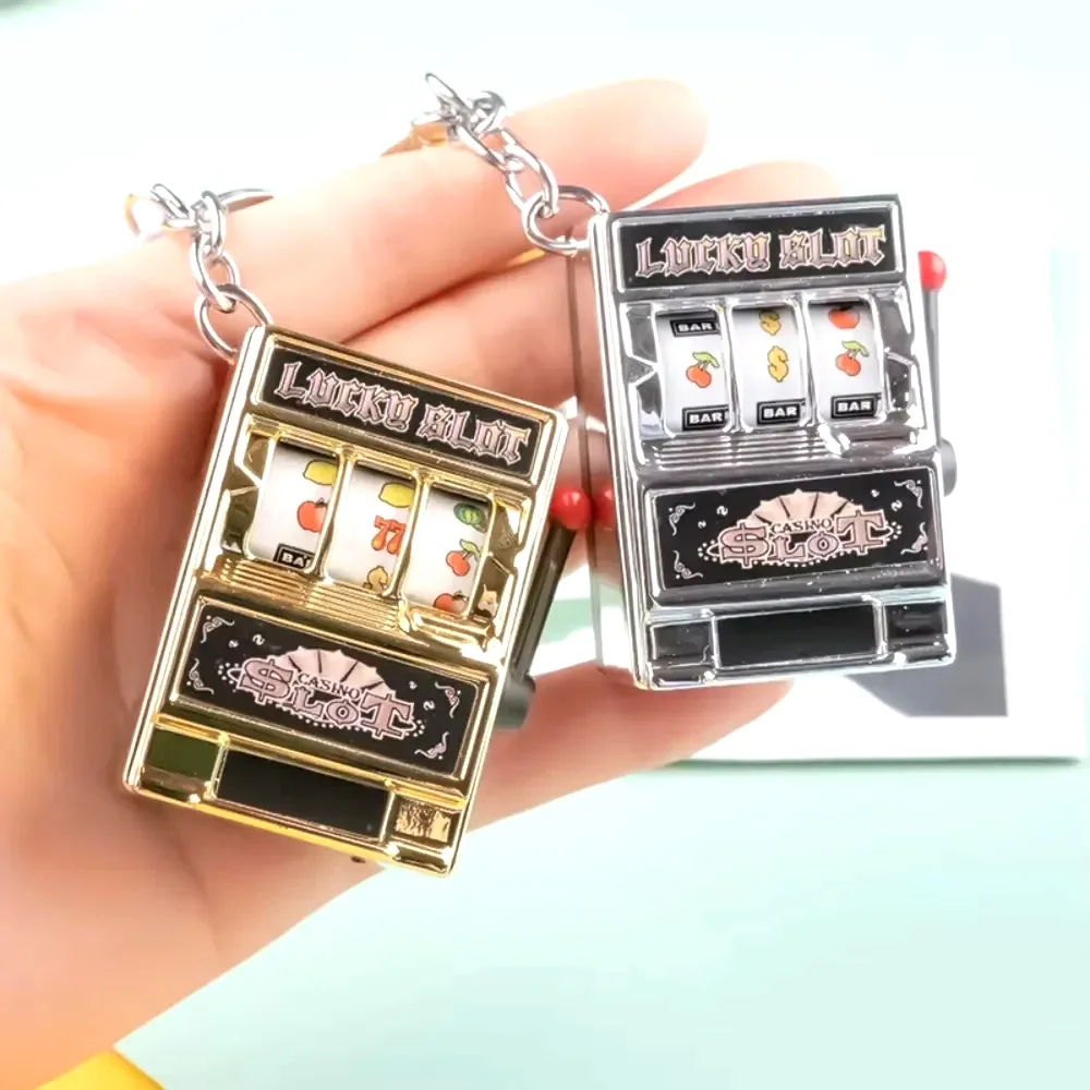Retro Electroplated Fruit Machine Shake Toy Keychain Pendant – Mini Game Console Shaped Stress-Relief Toy, Delicate Charm for Bags & Car Keys, Creative Fun Accessory for Gifting or Daily Use
