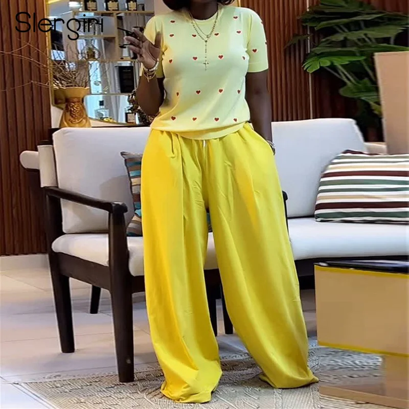 طقم بناطيل نسائية من Slergiri موضة صيف 2025 على شكل قلب 0 ورقبة قصيرة وأكمام قصيرة مع بنطال ذو قصة أرجل واسعة طقم موضة حلوة مكون من قطعتين #1