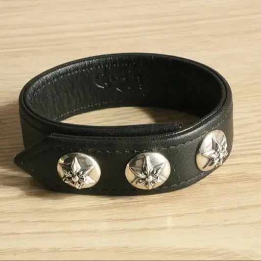 

Pure silver hexagonal star willow nail leather bracelet, personalized trendy accessory, cool hip-hop black leather bracelet