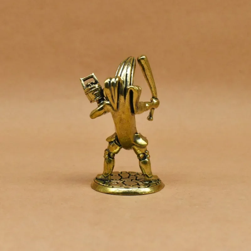 Brass Banana Warrior Figurine Retro Metal Mini Banana Archer Statue Sculpture Desktop Ornament Fantasy Collectible Decor Gift