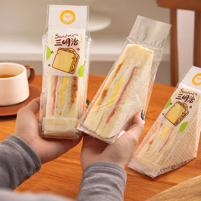 100pcs Sandwich kemasan plastik tas segitiga transparan untuk roti Butty tas pesta ulang tahun dekorasi suguhan