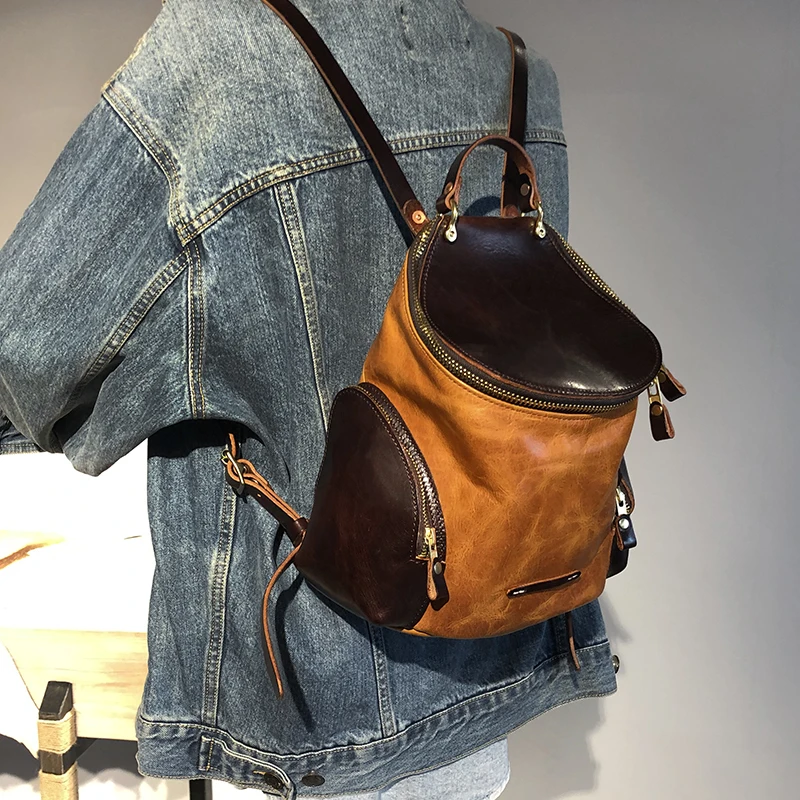 

Vegetable Tanned Leather Backpack Bucket Stereo Pocket Ladies Luxury Brand Bag 2022 Retro High Quality Ladies Fashion School Bag