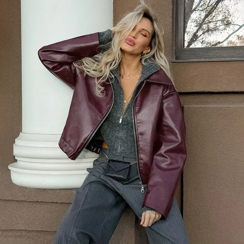 EAEOVNI الشارع الشهير سترة جلدية PU المرأة موضة بلون التلبيب سحاب أكمام طويلة معطف قصير موضة الخريف الشتاء جديد