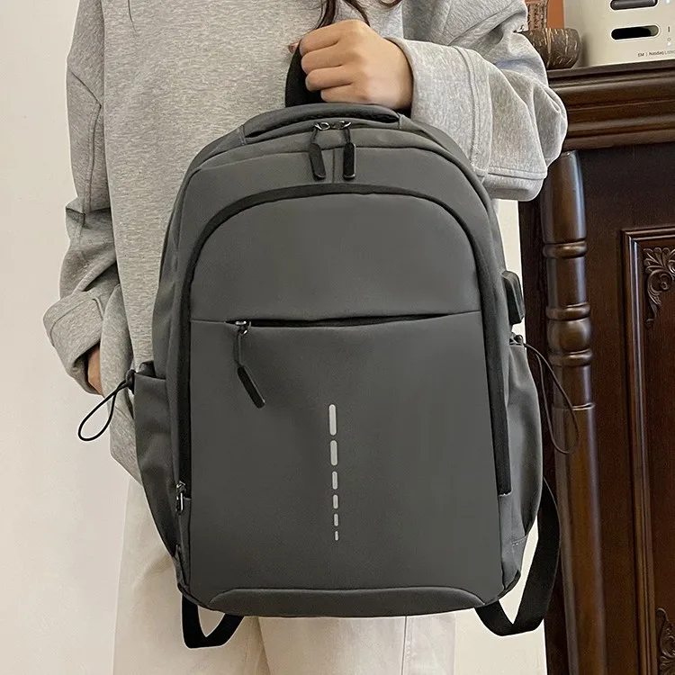 

Large capacity backpack business commute 14-inch schoolbag water-resistant and durable computer backpack.