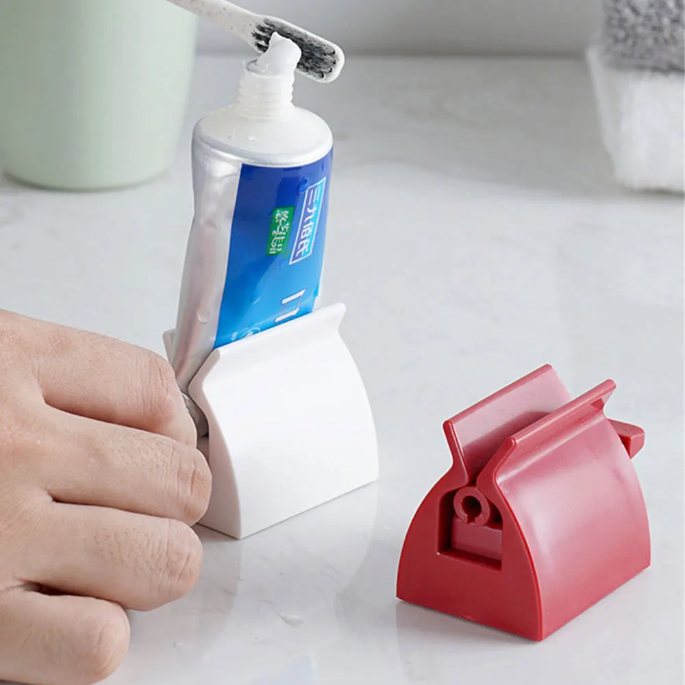 1pcs White/Red Rolling Toothpaste Tube Squeezer ABS Toothpaste Cosmetic Seat Dispenser Holder Stand Bathroom Accessories