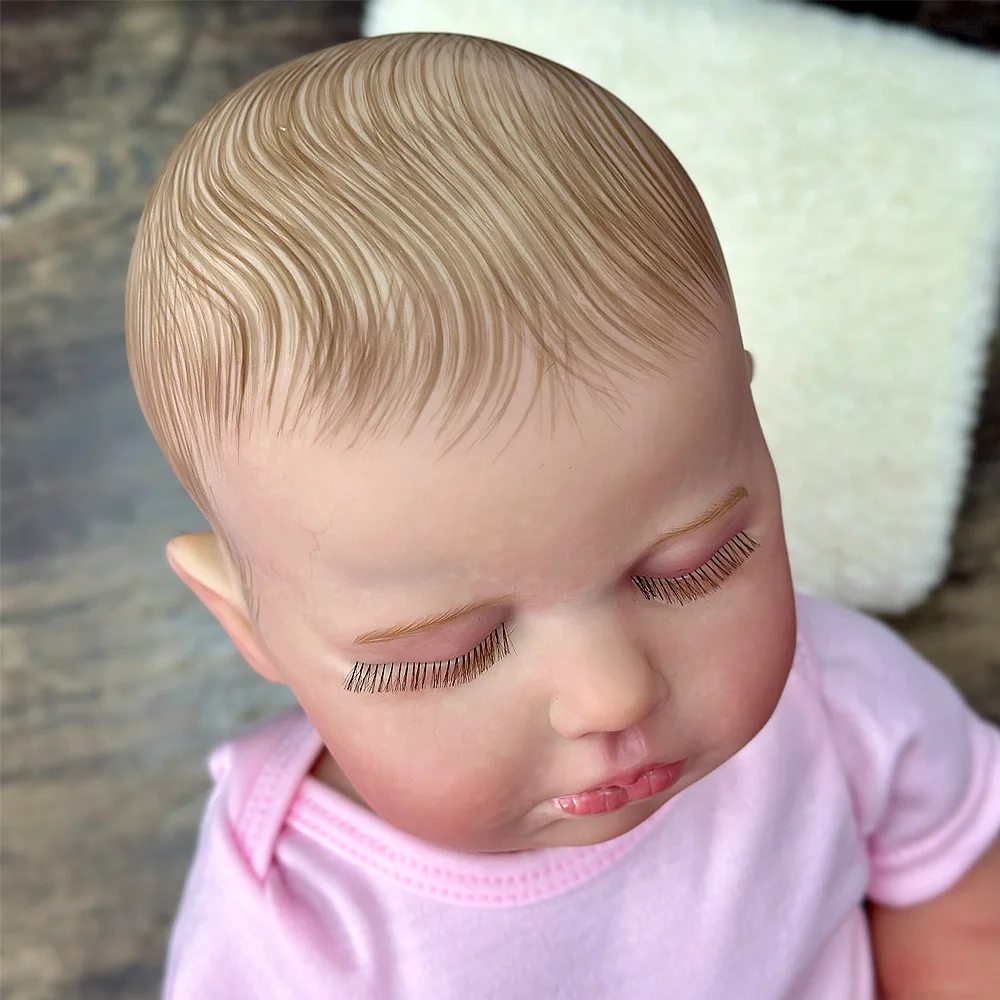 Muñeca Reborn de vinilo de 22 pulgadas |   Pelo pintado a mano, cara de porciones |   Textura realista |   Lavable y Sittable |   Conjunto de traje rosa |