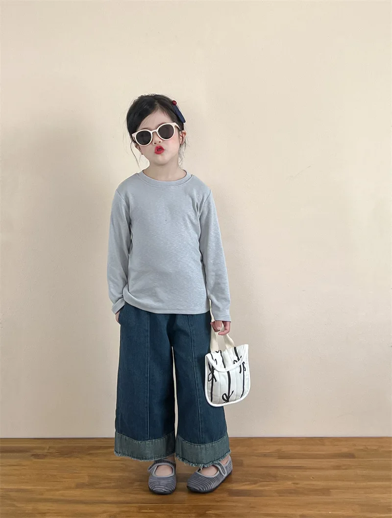 أطفال الخريف الربيع أسفل قميص 2025 جديد الكورية المألوف الفتيات الفتيان بلون طويل الأكمام بسيطة عادية اليومية تي شيرت