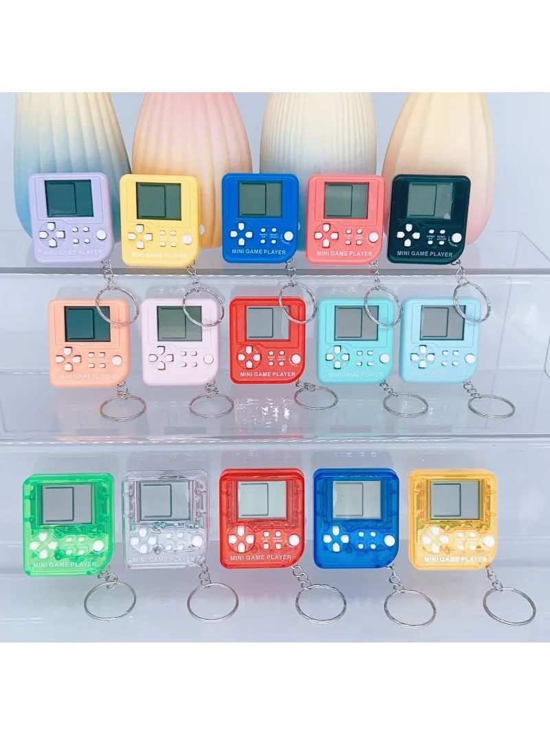 Console de jeu classique nostalgique Tetris Mini console de jeu portable Puzzle Porte-clés Cadeaux créatifs Jouets en gros
