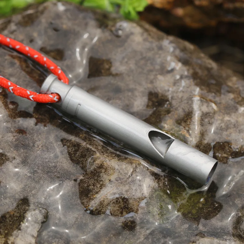 

Pure Titanium Survival Whistle Lightweight Portable Outdoor Survival Whistle Camping High Frequency Lanyard Titanium Whistle