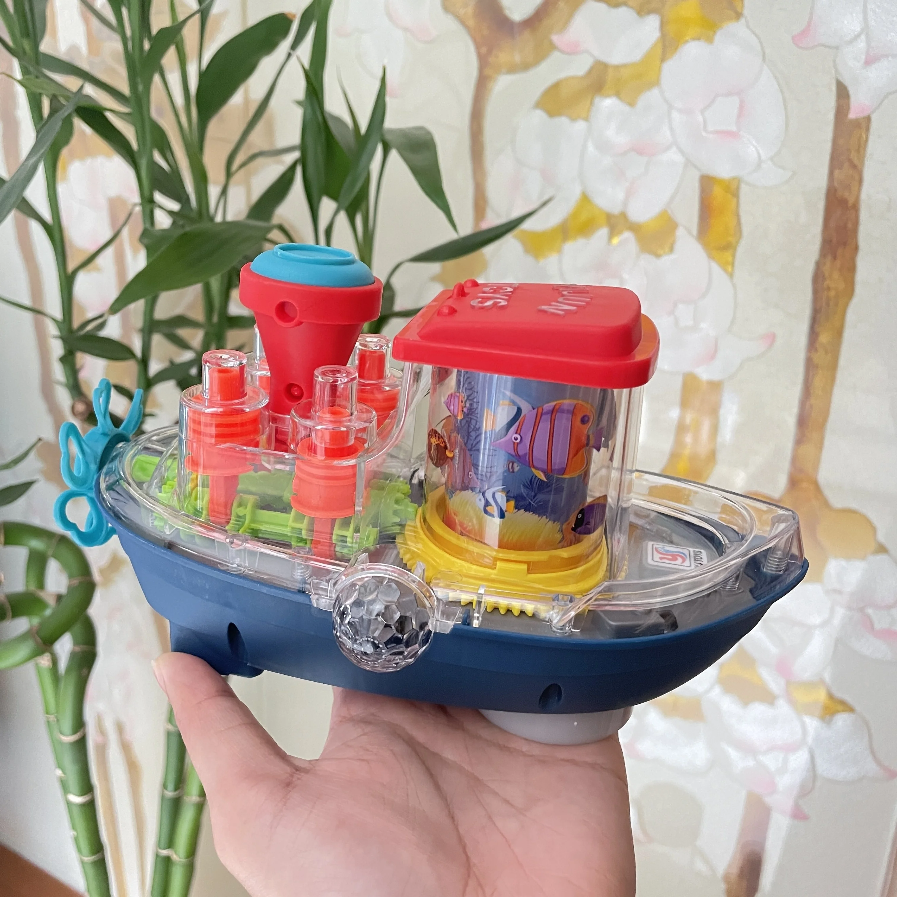 Przezroczysta statka z przekładniami, elektryczna uniwersalna zabawka, fajne zabawki, które uwielbiają dzieci (bateria nie jest dołączona), kolorowe światła, melodyczna muzyka.